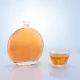 700ml flat circle odd bottle smooth liquor glass bottle