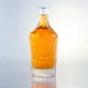 087-700ml unique design embossed brandy glass bottle with cork