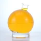 398- 750ml Odd-shaped spherical clear glass bottle with cork