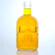 419-skull face 700ml super flint cork finished glass bottle