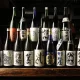 What are the effects of bottle color on sake