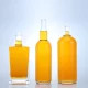 What aspects should be checked when accepting glass alcohol bottles?